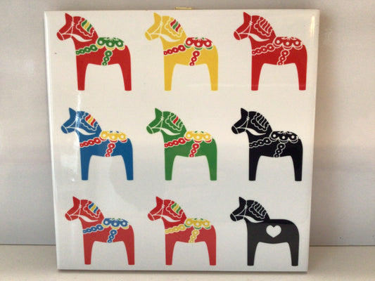Nine Dalas on a Ceramic Tile